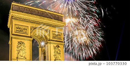 Celebratory colorful fireworks over the Arc de Triomphe, Paris, France 103770330