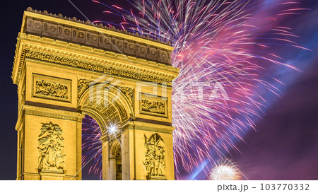 Celebratory colorful fireworks over the Arc de Triomphe, Paris, France 103770332