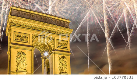 Celebratory colorful fireworks over the Arc de Triomphe, Paris, France 103770333