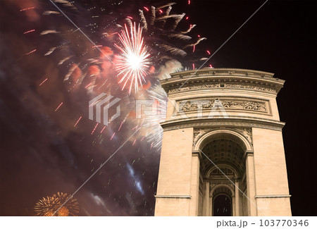 Celebratory colorful fireworks over the Arc de Triomphe, Paris, France 103770346