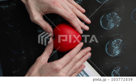 the heart symbol is in the doctor's hands. Protection concept the heart symbol is in the doctor's hands. Protection concept 103772839