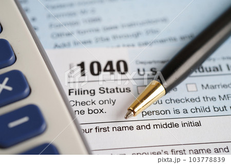 Tax form 1040 U.S. Individual Income Tax Return, business finance concept. Tax form 1040 U.S. Individual Income Tax Return, business finance concept. 103778839