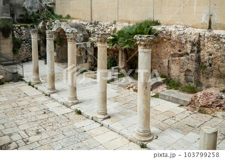 Ancient roman columns on the Cardo street in the Old city of Jerusalem 103799258