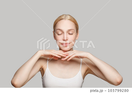 Portrait of pretty healthy woman. Facial treatment, body care and cosmetology concept 103799280