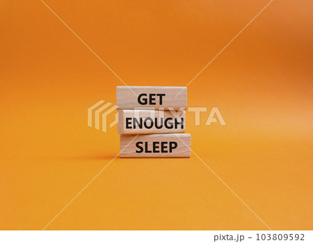 Get enough sleep symbol. Wooden blocks with words Get enough sleep. Beautiful orange background. Healthy lifestyle, medical and Get enough sleep concept. Copy space. Get enough sleep symbol. Wooden blocks with words Get enough sleep. Beautiful orange background. Healthy lifestyle, medical and Get enough sleep concept. Copy space. 103809592