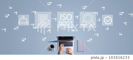 ISO 9001 concept with person working with laptop 103816233