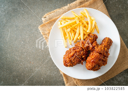spicy Korean fried chicken with fries spicy Korean fried chicken with fries 103822585