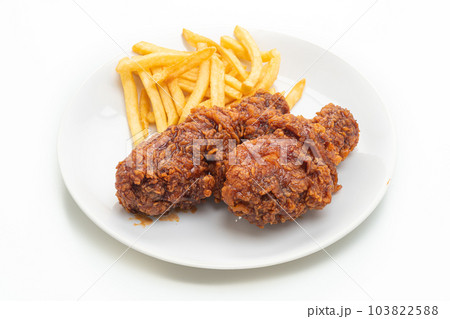 spicy Korean fried chicken with french fries 103822588