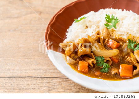 Japanese curry rice with sliced pork, carrot and onions Japanese curry rice with sliced pork, carrot and onions 103823268