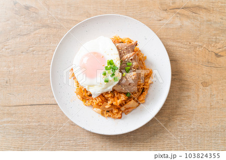 Kimchi fried rice with fried egg and pork Kimchi fried rice with fried egg and pork 103824355