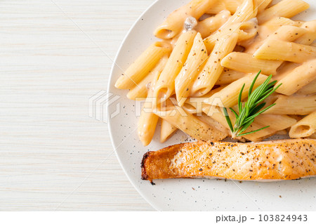 salmon with penne pasta cream sauce salmon with penne pasta cream sauce 103824943