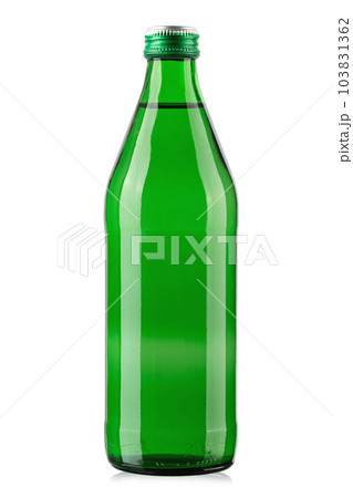 Green glass bottle of mineral water isolated on white background. Green glass bottle of mineral water isolated on white background. 103831362