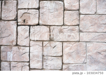 stone wall as a background or texture. antique wall. pink stone. building. architecture stone wall as a background or texture. antique wall. pink stone. building. architecture 103834750