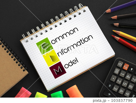 CIM - Common Information Model acronym on notepad, concept background 103837790