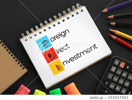 FDI - Foreign Direct Investment acronym on notepad, business concept background FDI - Foreign Direct Investment acronym on notepad, business concept background 103837881