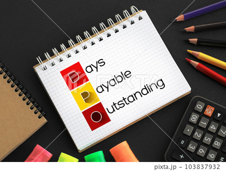 DPO Days Payable Outstanding - efficiency ratio that measures the average number of days a company takes to pay its suppliers, acronym text concept background on notepad 103837932