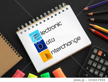EDI - Electronic Data Interchange acronym on notepad, technology concept background 103837950