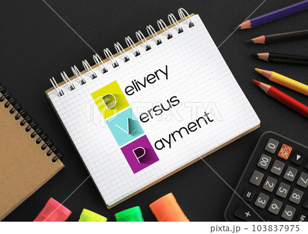 DVP - Delivery Versus Payment acronym on notepad, business concept background 103837975