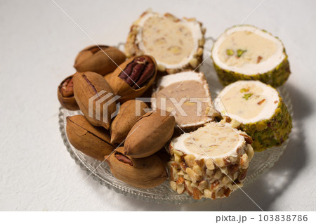 Delicious Turkish delight with pistachios and pecan 103838786