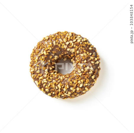 Sweet donut in chocolate glaze with peanuts on a white background top view 103848154