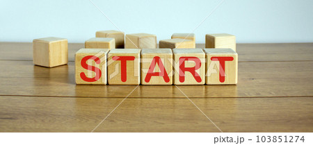 Concept word start on cubes on a beautiful wooden table. Concept word start on cubes on a beautiful wooden table. 103851274