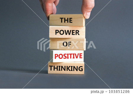 Positive thinking symbol. Concept words The power of positive thinking on wooden block. Beautiful grey background. Businessman hand. Business, motivational positive thinking concept. Copy space. Positive thinking symbol. Concept words The power of positive thinking on wooden block. Beautiful grey background. Businessman hand. Business, motivational positive thinking concept. Copy space. 103851286