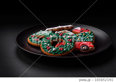 Delicious fresh colorful Christmas or New Year gingerbread cookies 103852141