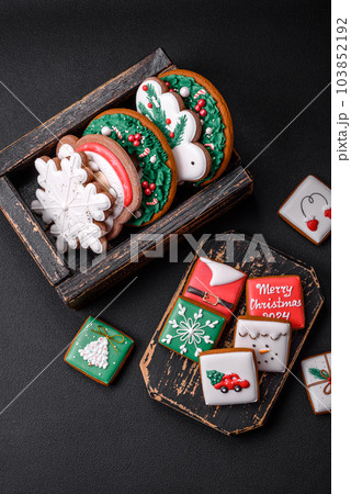 Delicious fresh colorful Christmas or New Year gingerbread cookies 103852192