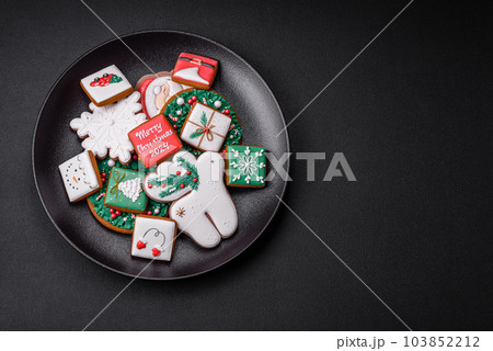 Delicious fresh colorful Christmas or New Year gingerbread cookies 103852212