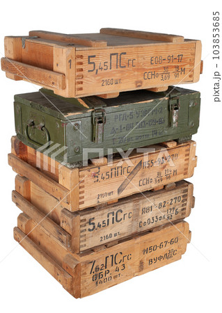 Army ammunition stack of wooden crates. Text in russian - type of ammunition, projectile caliber, projectile type, number of pieces and weight. 103853685