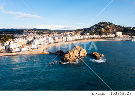 Drone view of Blanes overlooking Sa Palomera Rock and San Juan castle hill Drone view of Blanes overlooking Sa Palomera Rock and San Juan castle hill 103858328