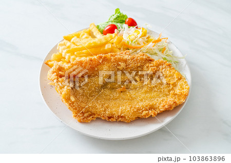 fried fish and potatoes chips 103863896