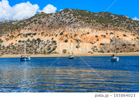 Yachts sailing in the Mediterranean sea near Kekova island in Antalya province, Turkey. Turkish Riviera 103864023