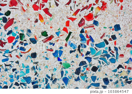 Colorful of tile-shard mosaic and stone decorating on the wall for background Colorful of tile-shard mosaic and stone decorating on the wall for background 103864547