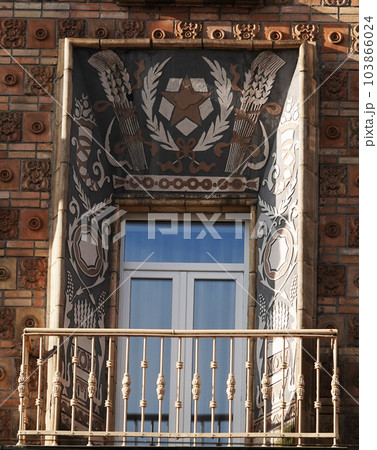 Kiev, Ukraine January 2, 2021: Facade of an old building with a balcony in the center of Kiev Kiev, Ukraine January 2, 2021: Facade of an old building with a balcony in the center of Kiev 103866024