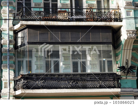 Kiev, Ukraine January 2, 2021: Facade of an old building with a balcony in the center of Kiev 103866025