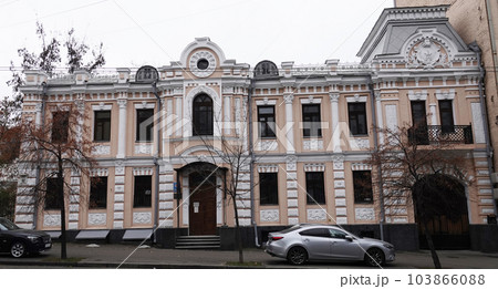 Kiev, Ukraine November 28, 2020: Facade of a building artistically decorated with columns in the center of Kiev 103866088