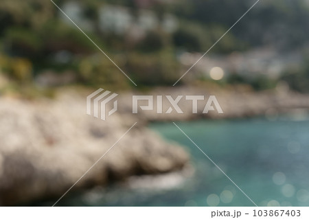 Blurred background of Cap de Nice in spring in daytime Blurred background of Cap de Nice in spring in daytime 103867403