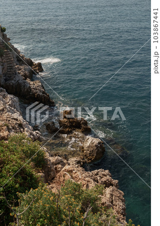 Wild coast of Cap de Nice on a warm spring day 103867441