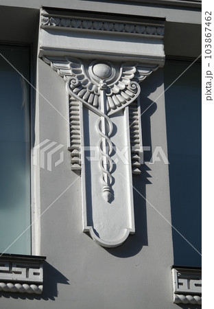 Kiev, Ukraine June 10, 2021: Elements of artistic decoration of the facade of a building in the city of Kiev Kiev, Ukraine June 10, 2021: Elements of artistic decoration of the facade of a building in the city of Kiev 103867462