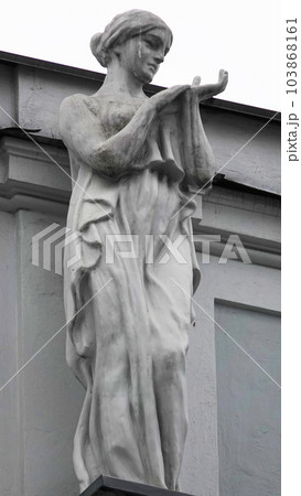 Kiev, Ukraine November 28, 2020: Artistic decoration of the facade of the building with sculptures and busts of people in the city of Kiev Kiev, Ukraine November 28, 2020: Artistic decoration of the facade of the building with sculptures and busts of people in the city of Kiev 103868161