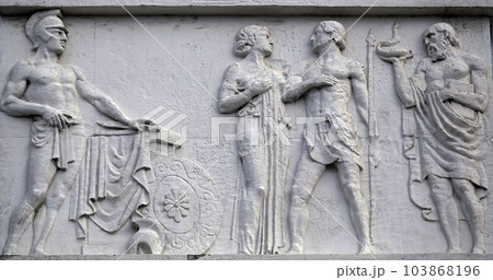 Kiev, Ukraine April 13, 2021: Architectural decorations, frescoes on a building with different subjects from ancient legends in the city of Kiev 103868196