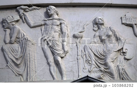 Kiev, Ukraine April 13, 2021: Architectural decorations, frescoes on a building with different subjects from ancient legends in the city of Kiev 103868202