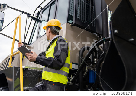 Engineer with mining truck 103869171