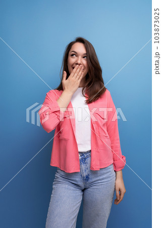 portrait of well-groomed european woman in casual look isolated with studio background 103873025