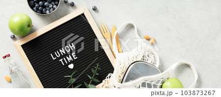 Lunch time letter board and healthy food flat lay Lunch time letter board and healthy food flat lay 103873267
