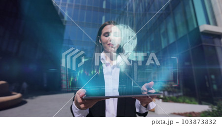 Friendly young businesswoman using digital computer tablet near office building. 3D Futuristic finance stock exchange market chart. 3d Animation. Friendly young businesswoman using digital computer tablet near office building. 3D Futuristic finance stock exchange market chart. 3d Animation. 103873832
