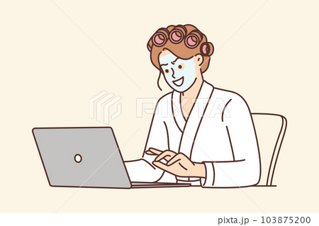 Woman internet troll and hater uses laptop sitting at home with mask on face and in curlers Woman internet troll and hater uses laptop sitting at home with mask on face and in curlers 103875200