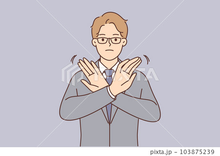 Businessman stops deal by demonstrating forbidding gesture and crossing arms in front of chest 103875239