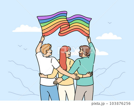 Group of people with LGBT flag travel with pride community and admire beautiful nature Group of people with LGBT flag travel with pride community and admire beautiful nature 103876256